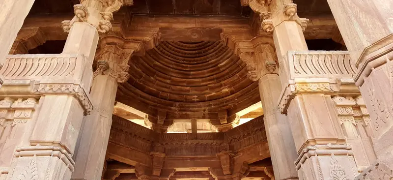 Red sandstone memorial architecture and gardens at Mandore
